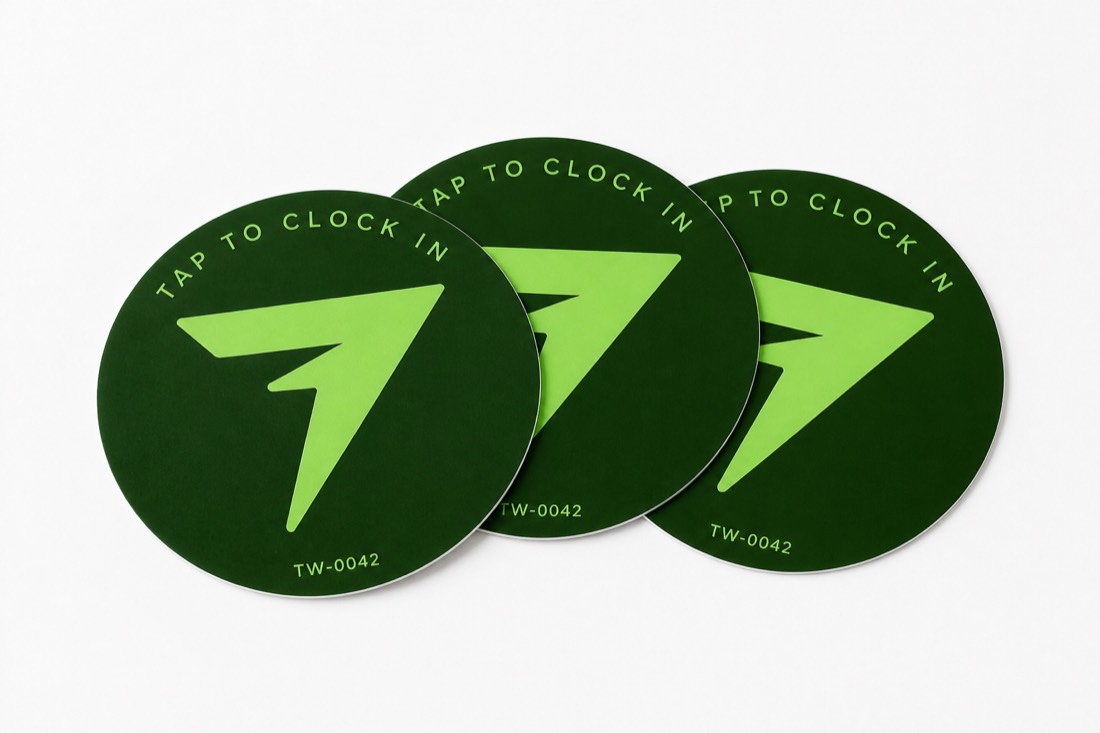 Three TapWren Tags fanned out in a loose stack.